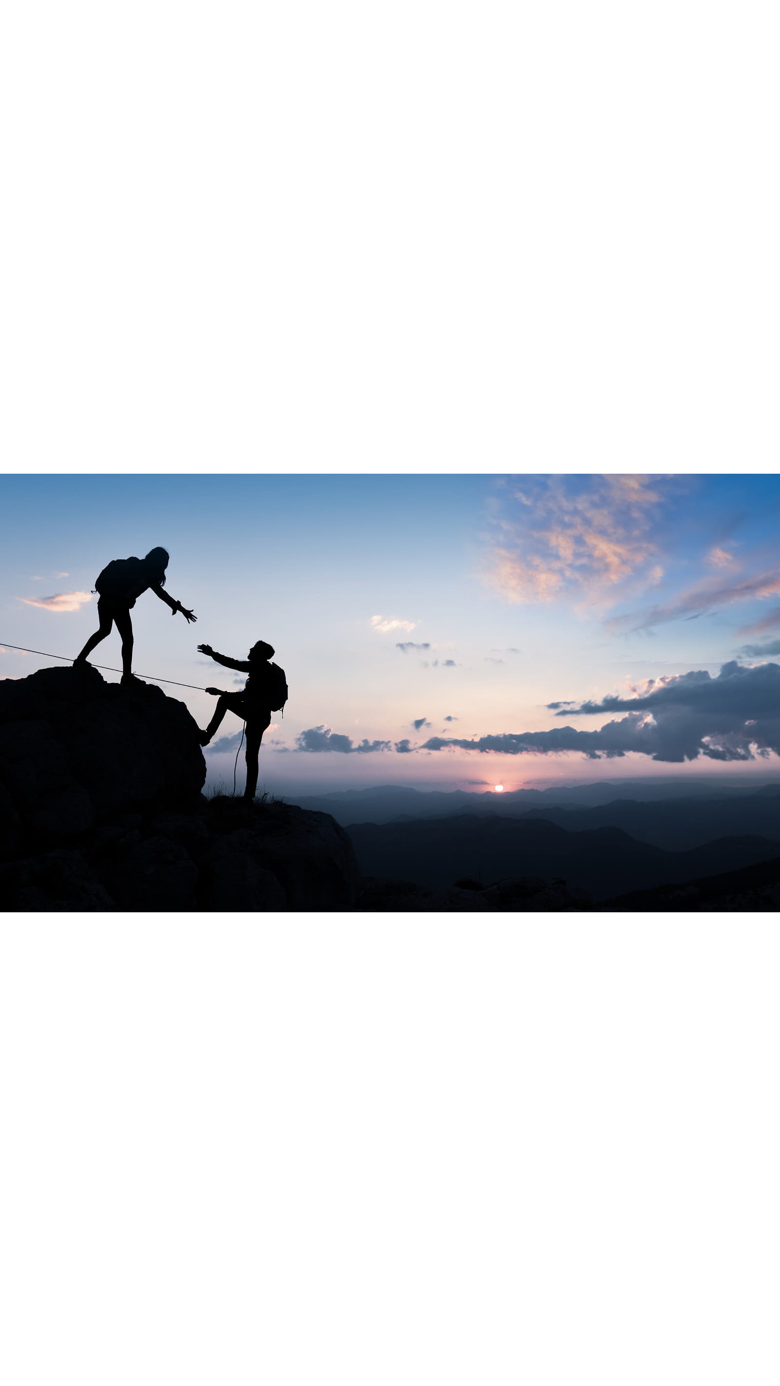 D&I diversity inclusion social mobility hiking couple rock climbing sunset