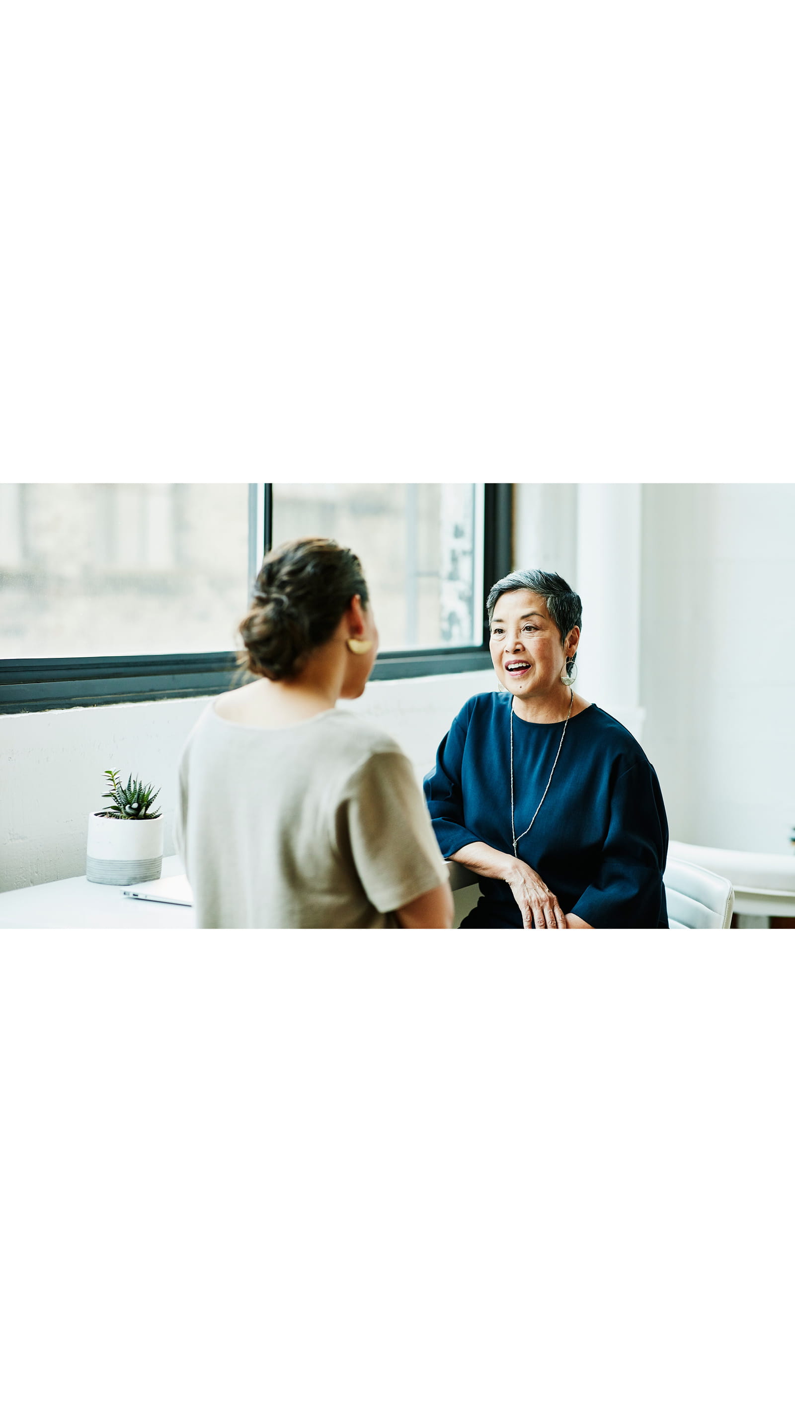 ICAEW students ethics two women office talking meeting