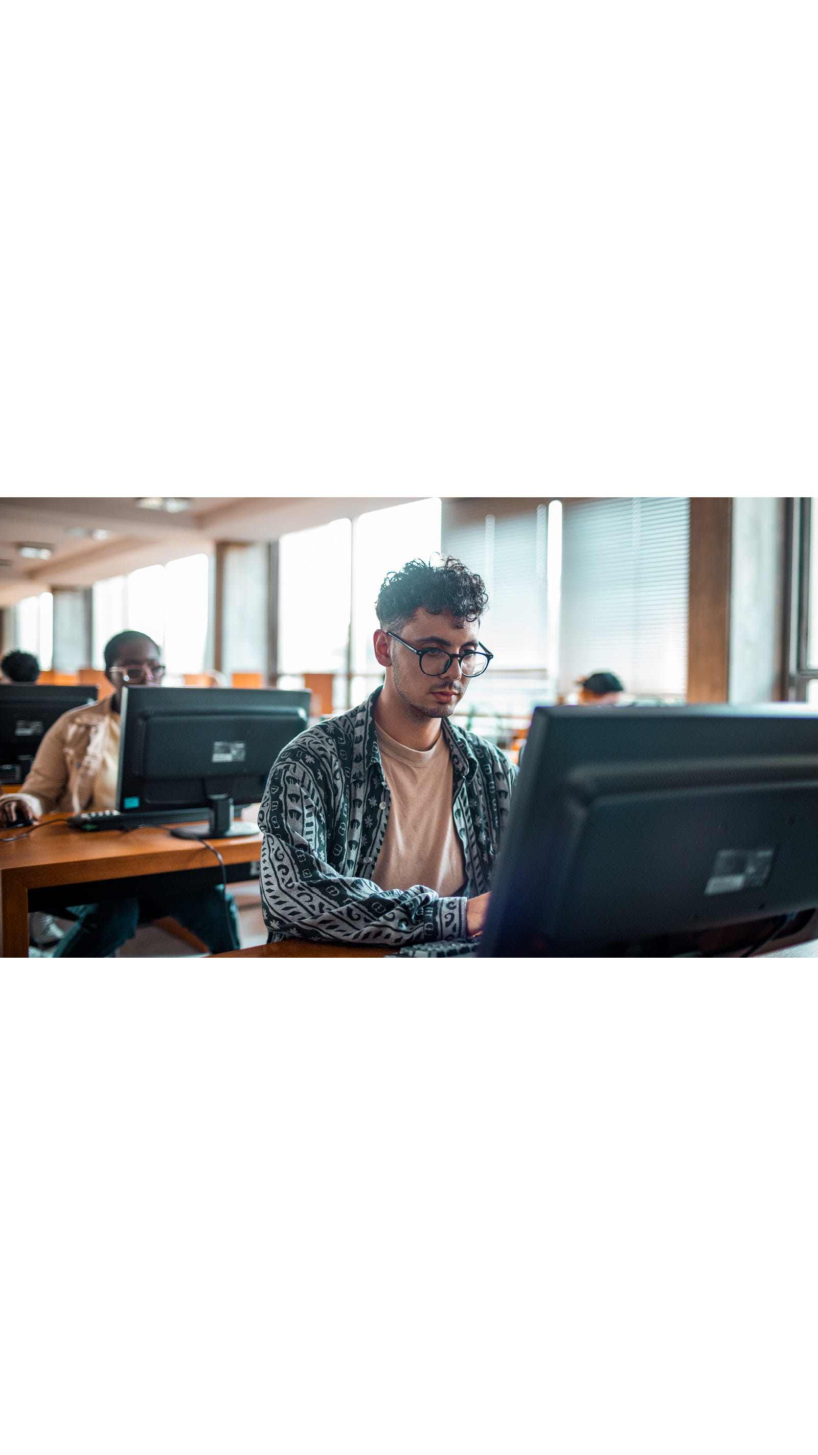 ICAEW Students young person man studying exams computer
