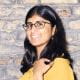 ICAEW Students Ashwini Poopalasingham ACA exam studies young asian woman yellow top