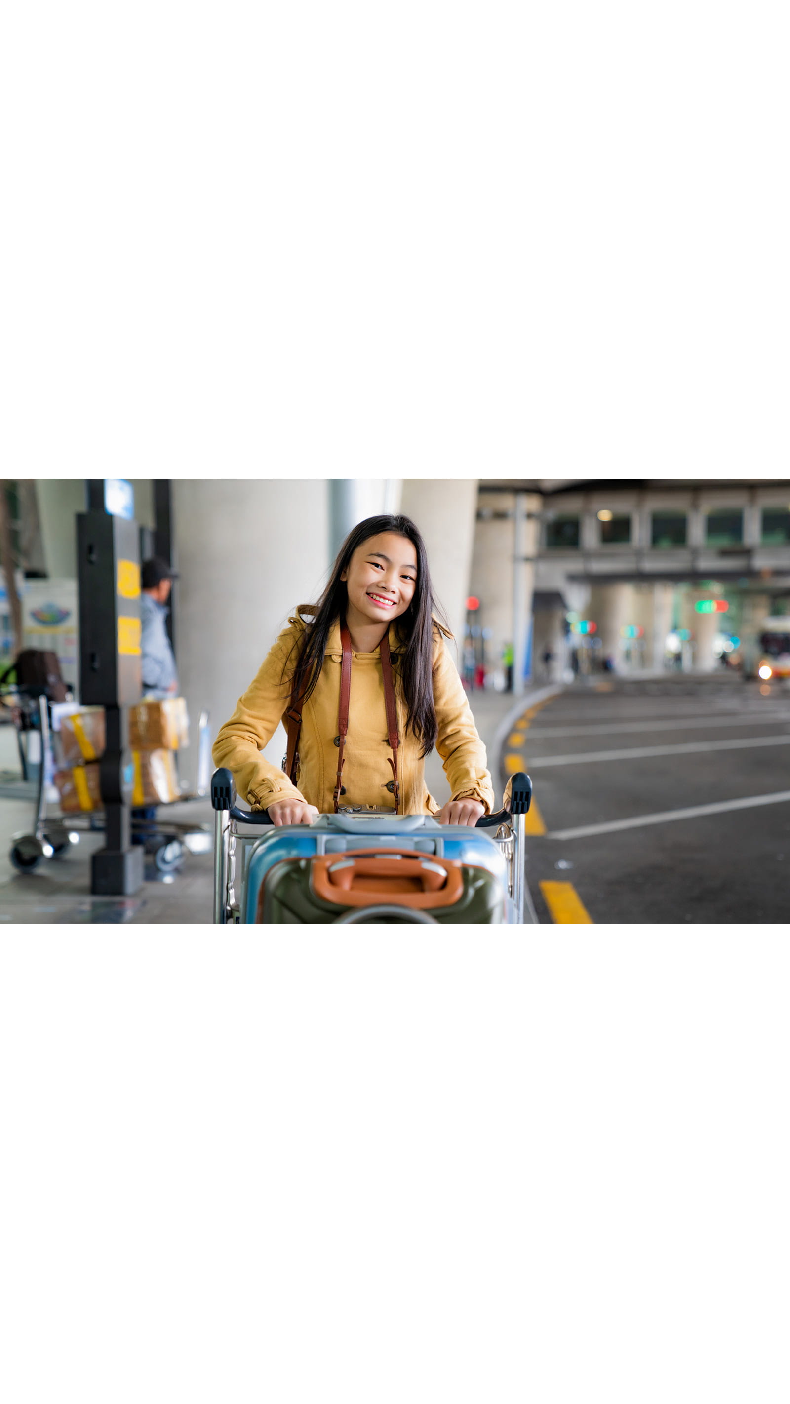 ICAEW Students international travel young lady airport trolley