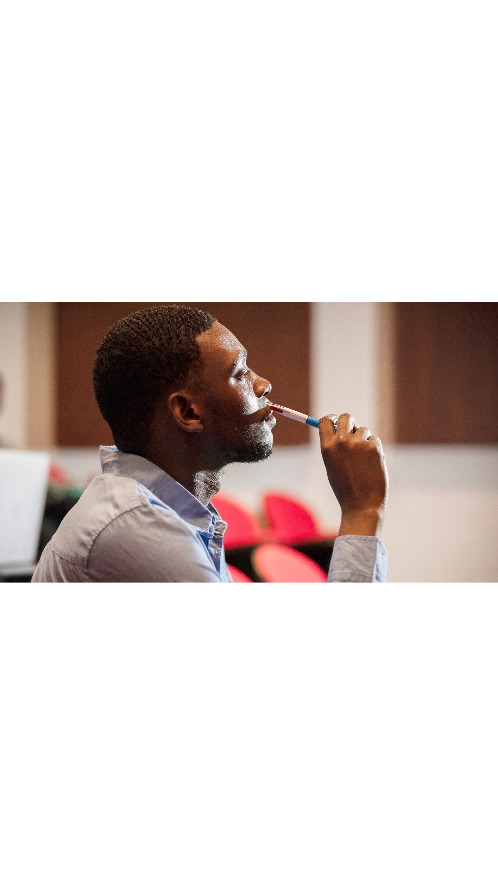 ICAEW Students resilience young black man student pen studying