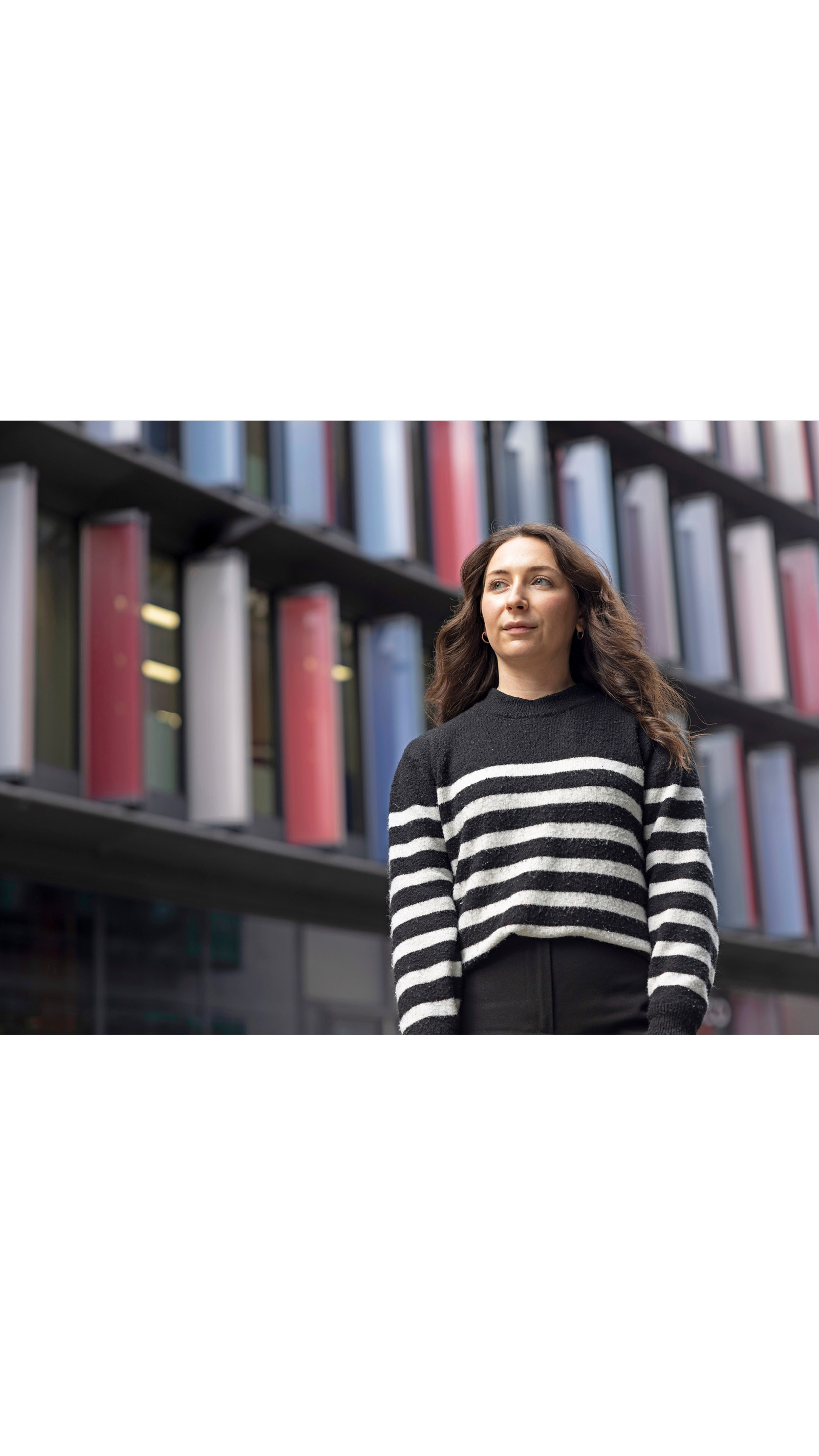 ICAEW mature student young woman city office stripe top jumper