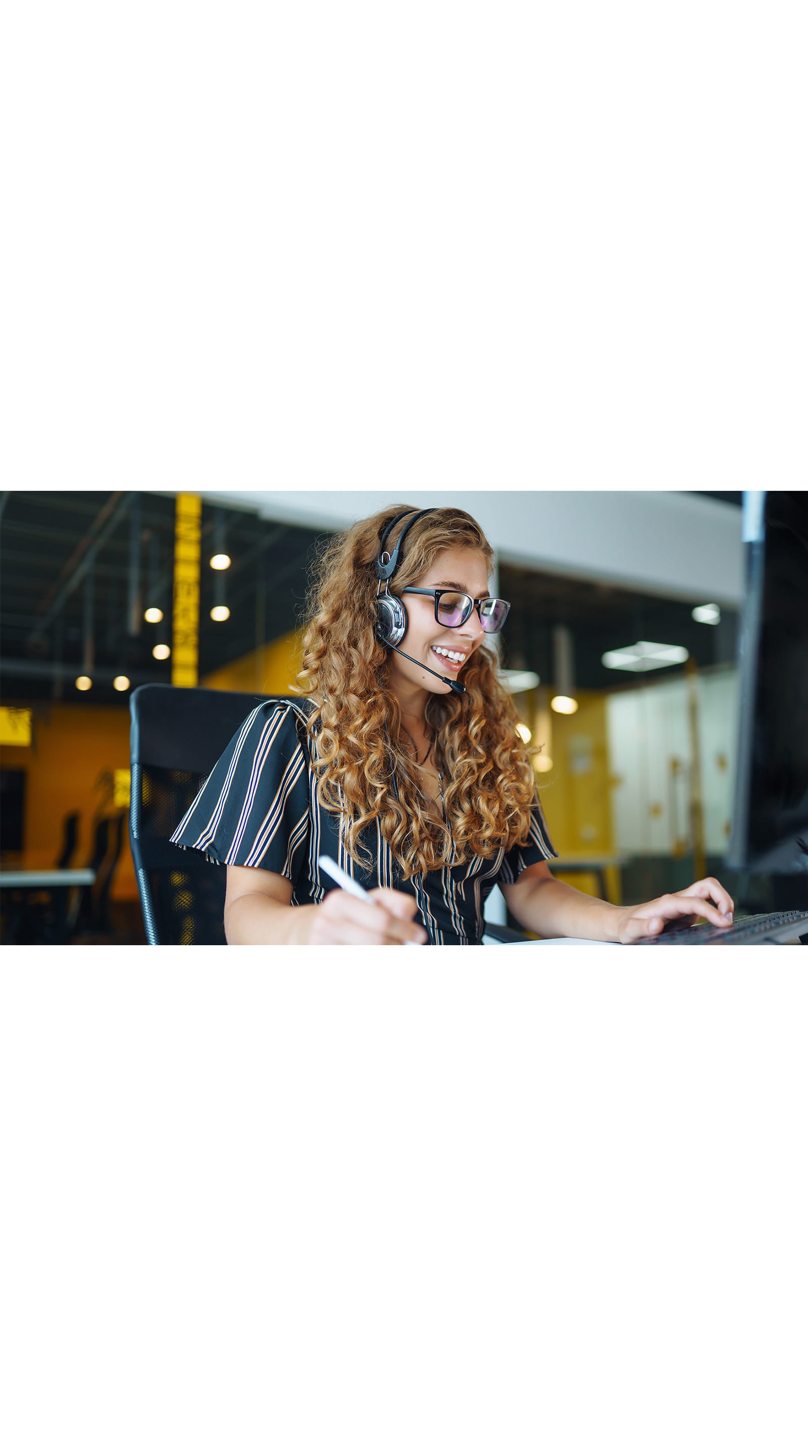 young woman support customer service caller phone headset long curly hair stripe shirt ICAEW Students FAQ