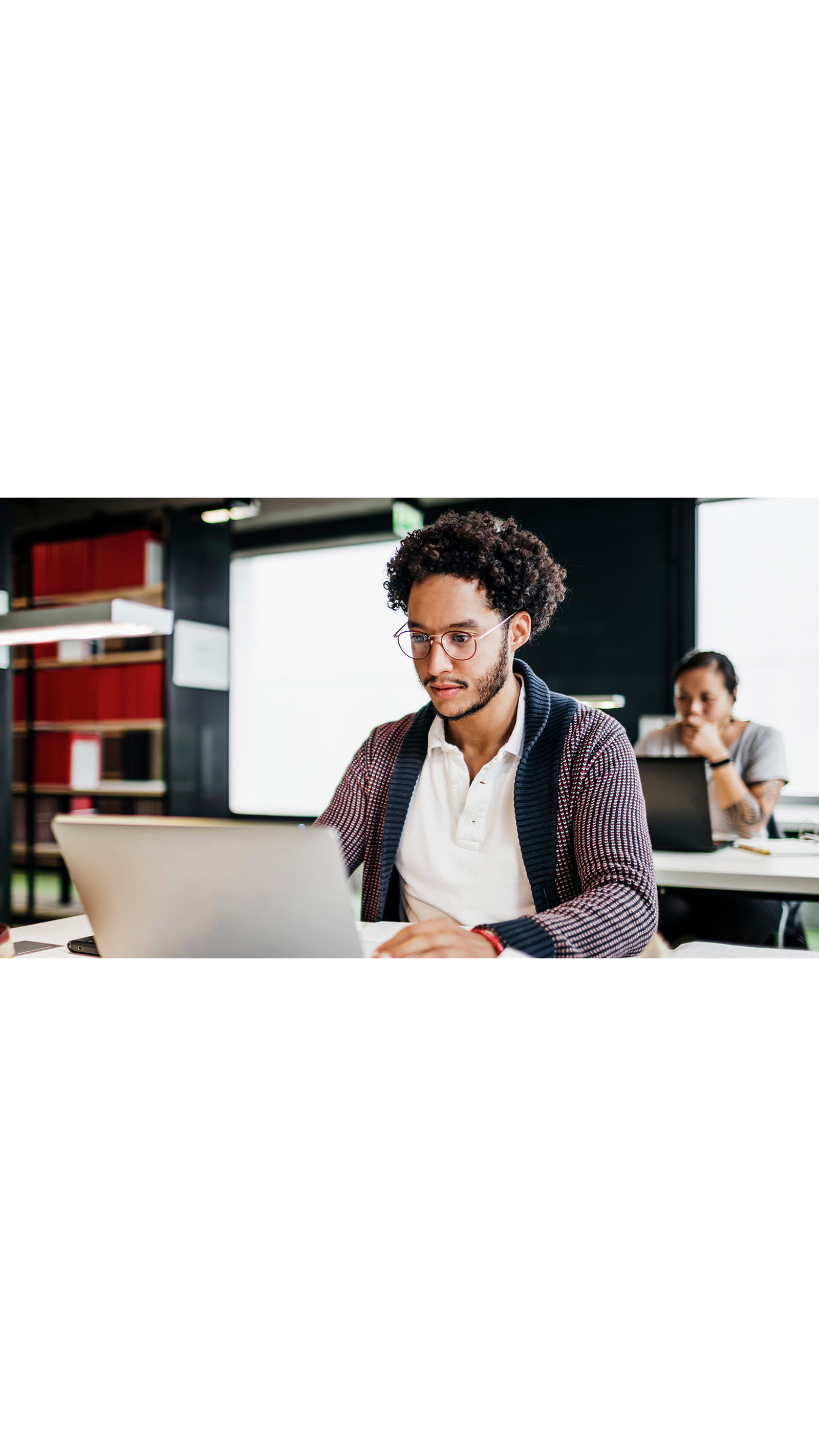 young man student glasses laptop studying training agreement ICAEW students accountant