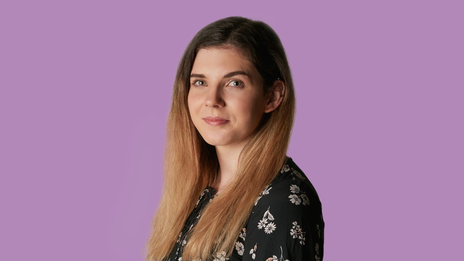 Brodie Cook, Assistant Manager at Albert Goodman LLP, accountant secondment purple background