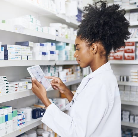 Pharmacist checking a prescription