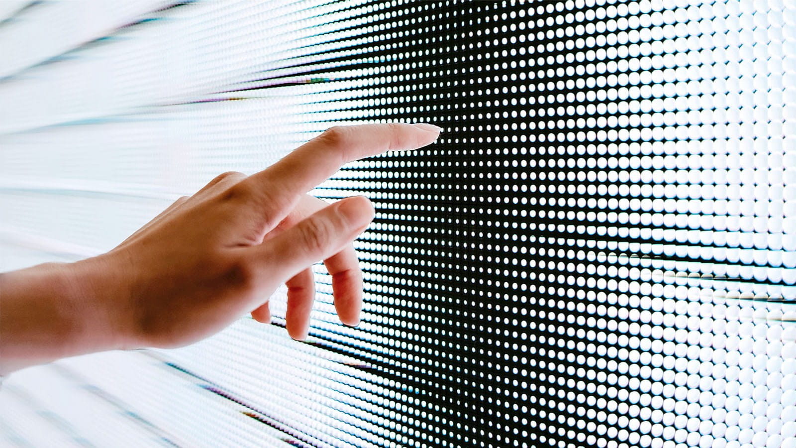 finger pointing touching screen digital black dots pixels ICAEW Audit & Beyond tech hub