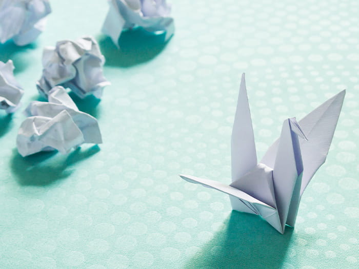 paper origami bird crane scrunched ICAEW Audit Beyond manager