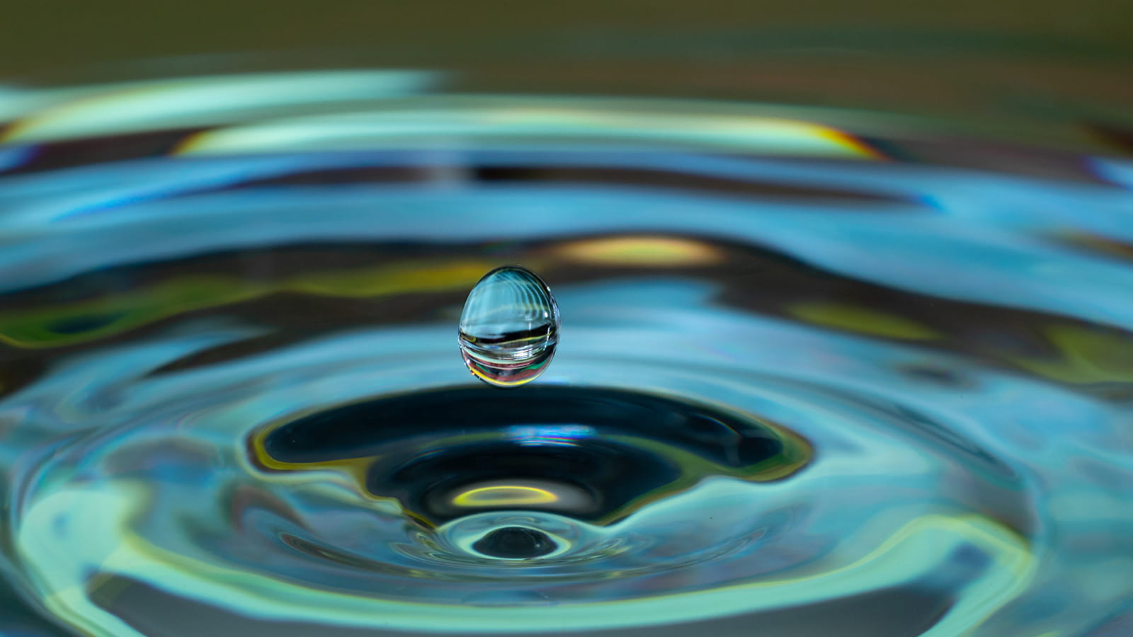 water droplet ripple blue green