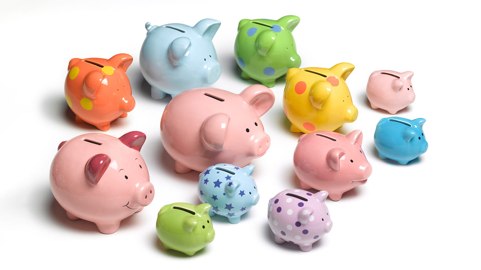 large group of piggy banks multi colours pink orange blue green yellow purple