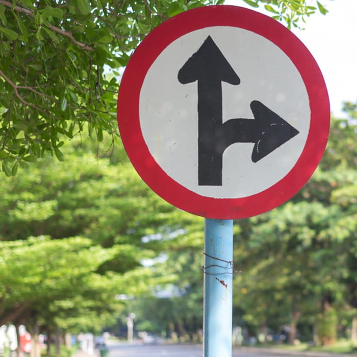 Road traffic sign showing directions