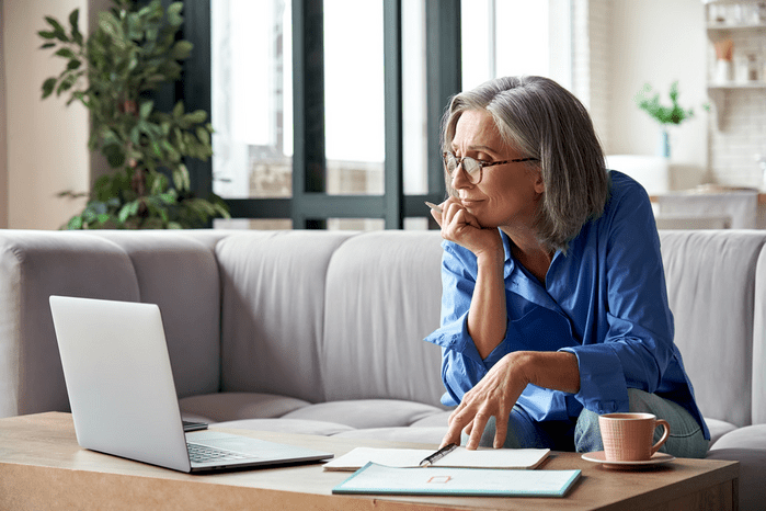 Woman on laptop remote working