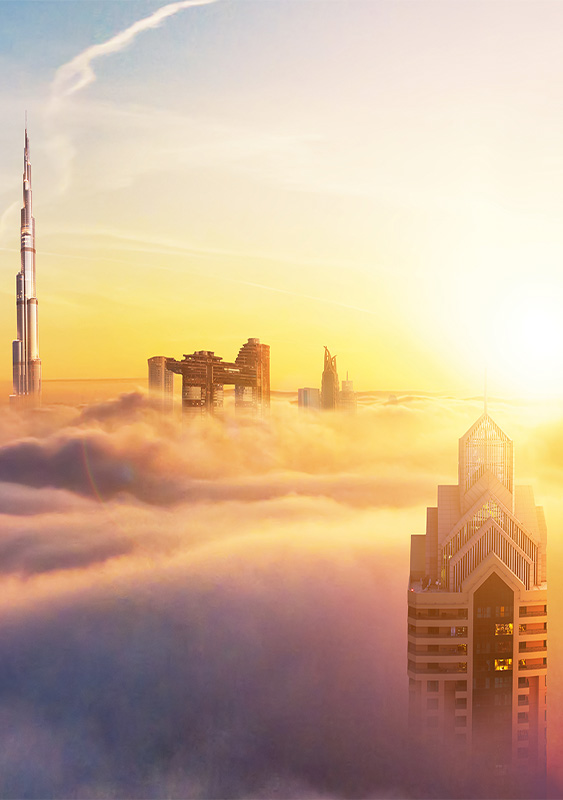 middle east Dubai Burj Khalifa city skyscrapers sunset above clouds ICAEW Corporate Financier