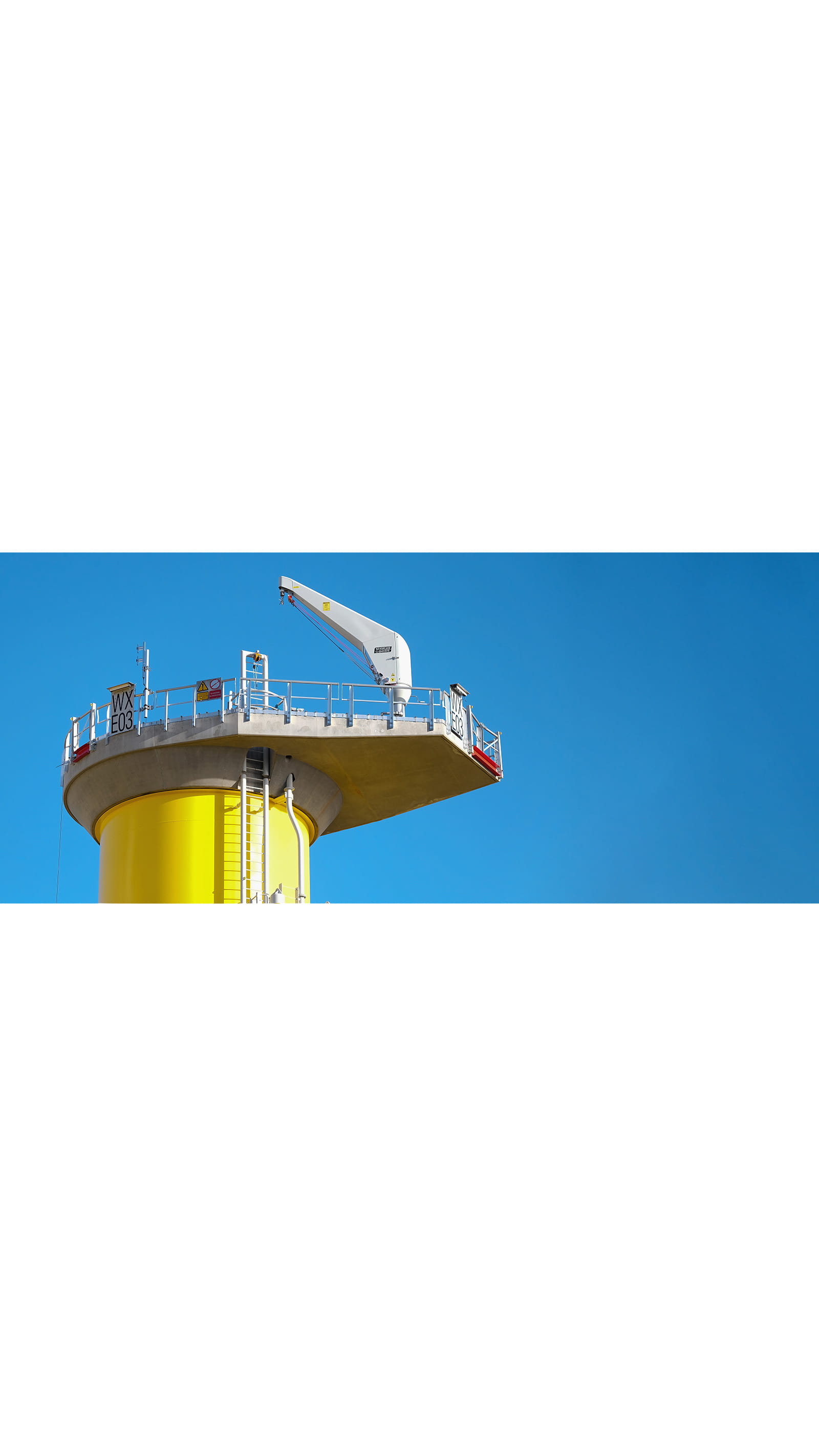 Offshore Structures wind farm facility in Birmingham transition piece yellow blue sky