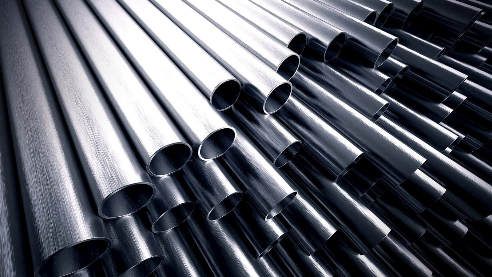 dark silver metal steel pipes stacked on top of each other