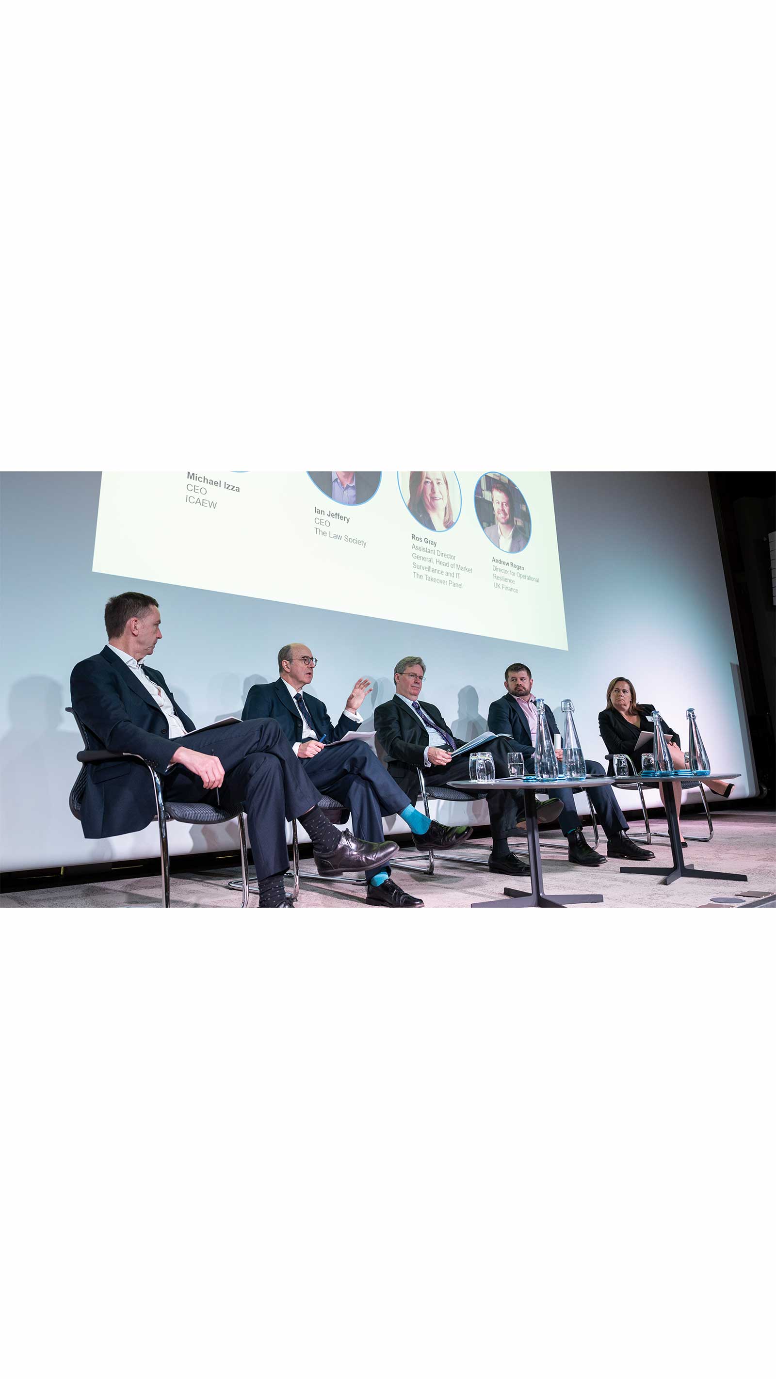 David Petrie (centre) chaired two cyber security discussion panels. Faculty launches new Cyber Security Guide