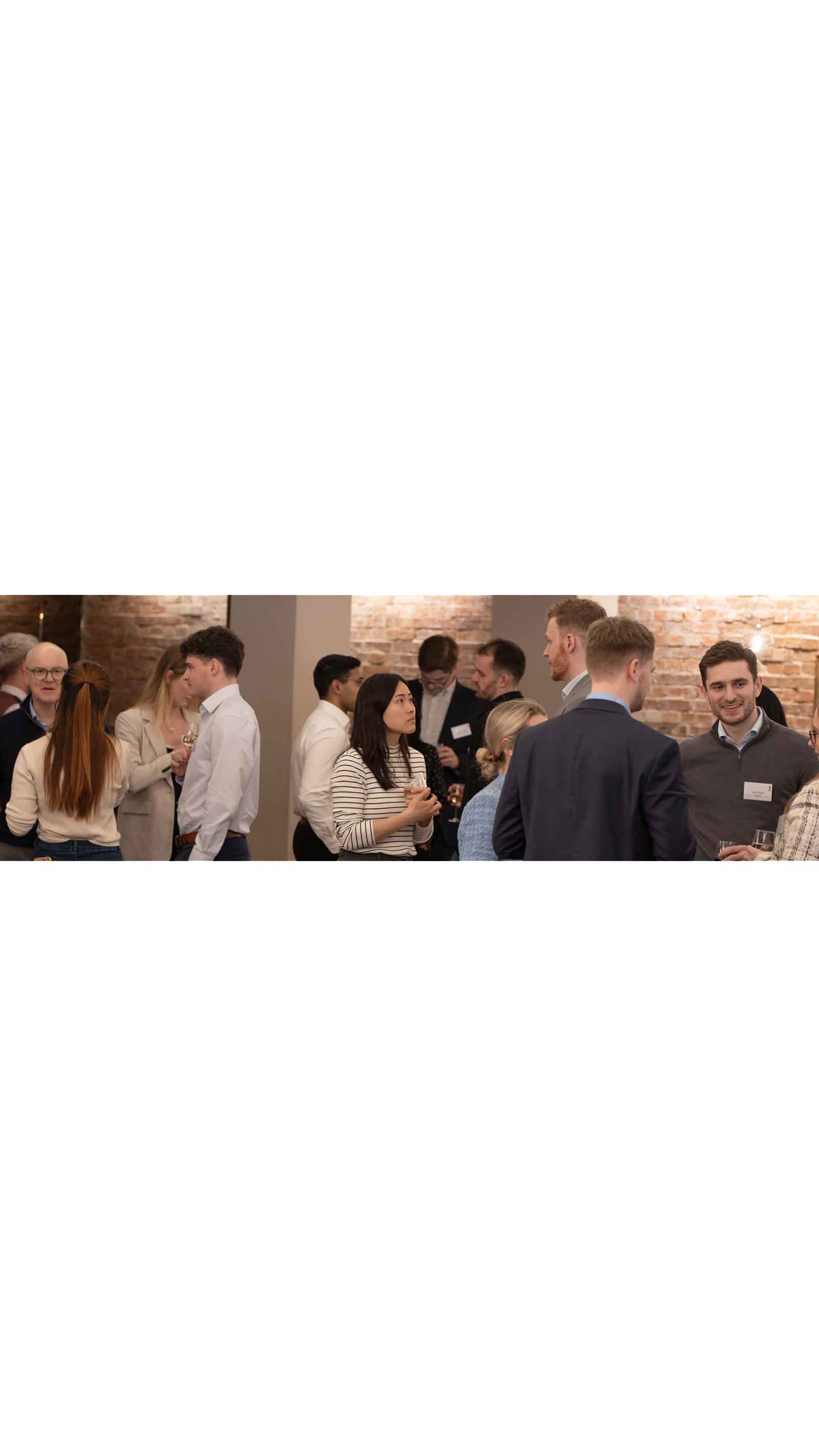 group of young people talking networking social work event