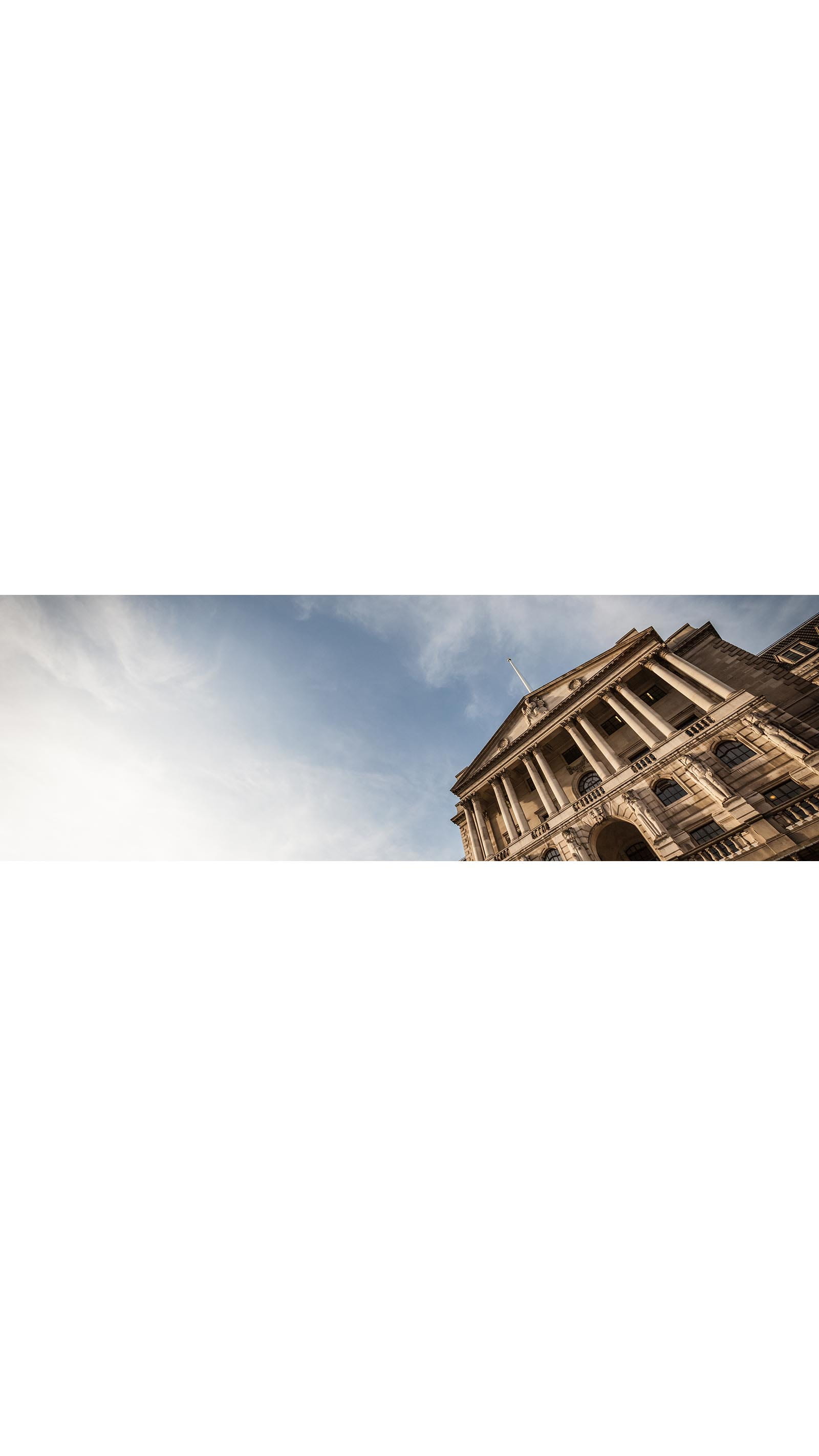 The Bank of England building London georgian architecture blue sky clouds above