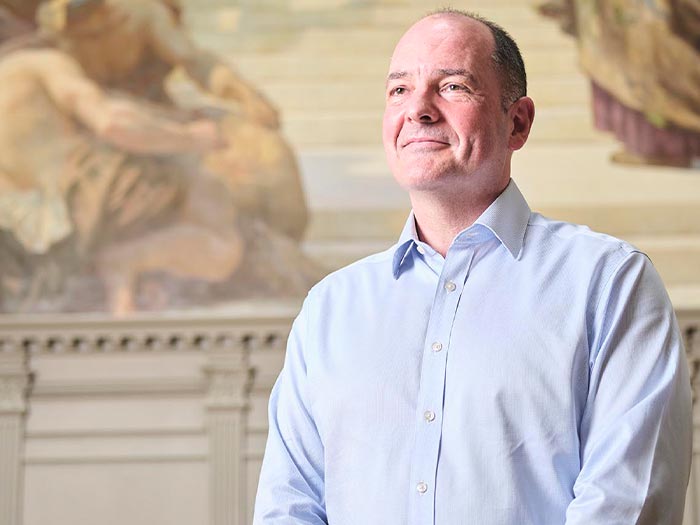 ICAEW CEO Alan Vallance, in front of mural at Chartered Accountants Hall, London