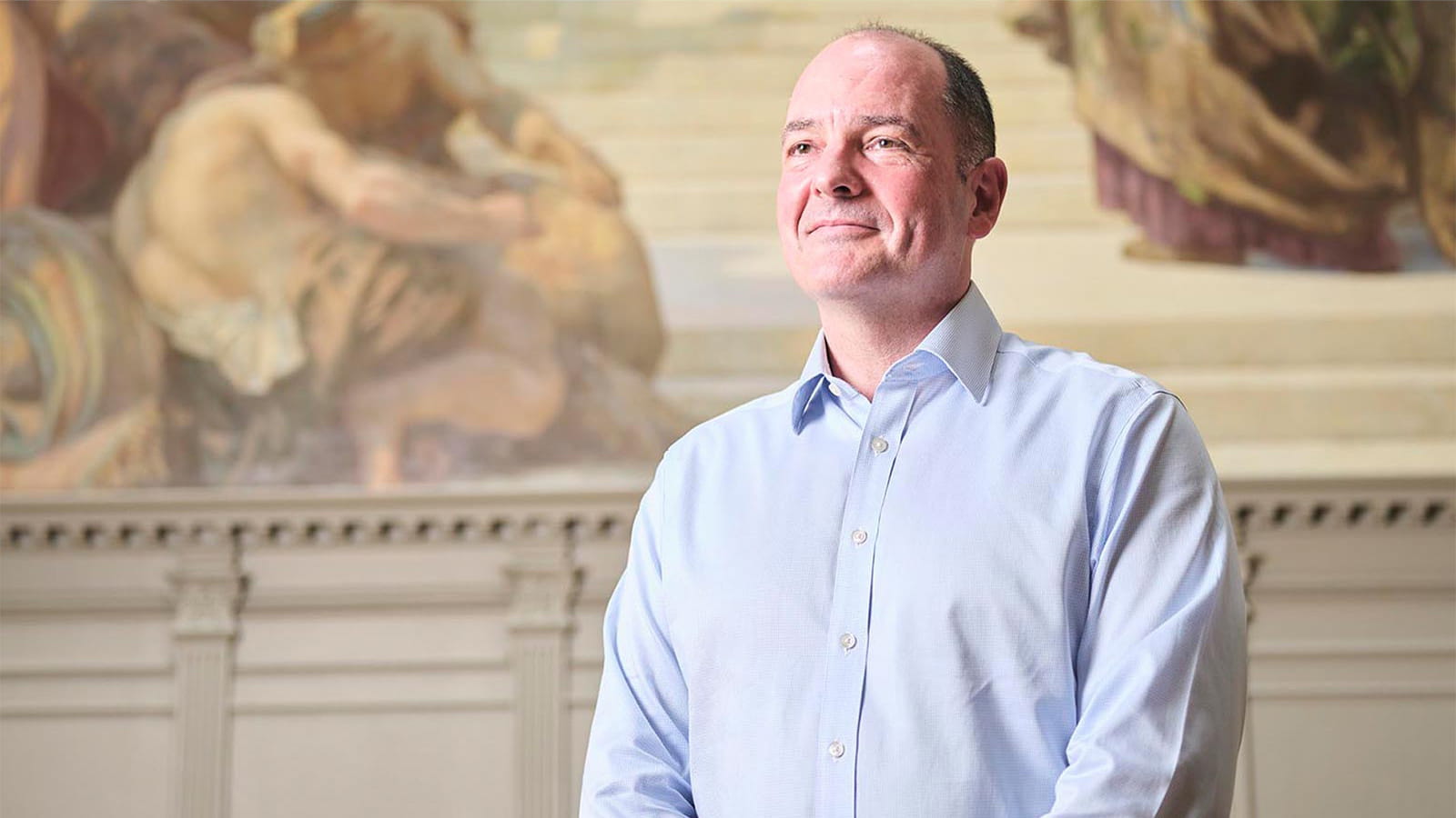 ICAEW CEO Alan Vallance, in front of mural at Chartered Accountants Hall, London