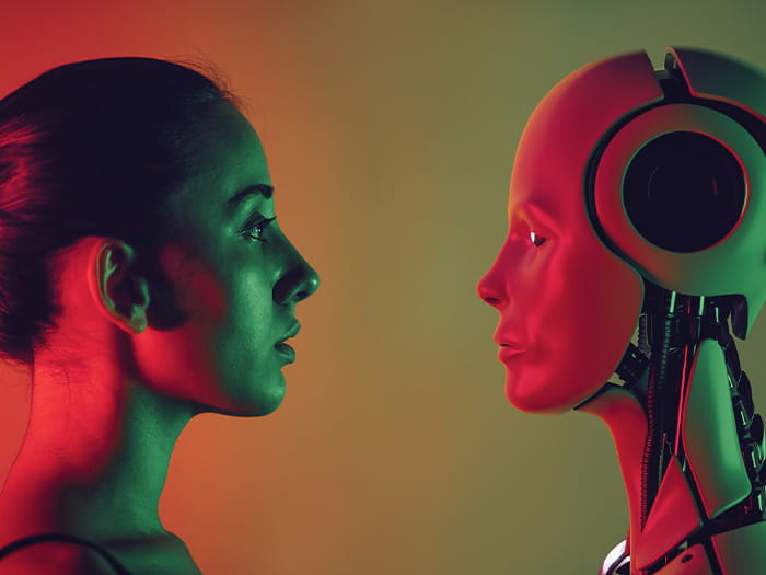 profile of a young woman with hair in a bun looking at an AI robot android red and green lighting