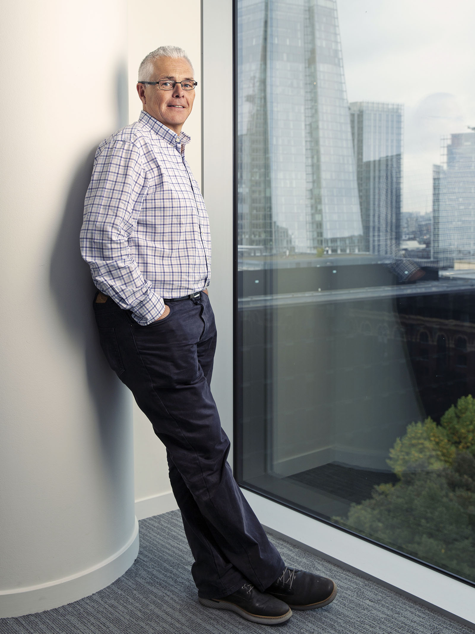 EY associate partner Chris Jarvill took over as chair of the Corporate Finance Faculty's technical committee, in front of London city skyline