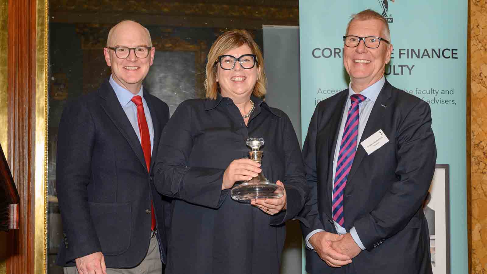 Alistair Brew and Andrew Rutherford, commercial director at Arbuthnot (a sponsor of the Annual Reception), presented the 2024 Corporate Development Award to Pearson deputy CFO, Rachel Coulson.