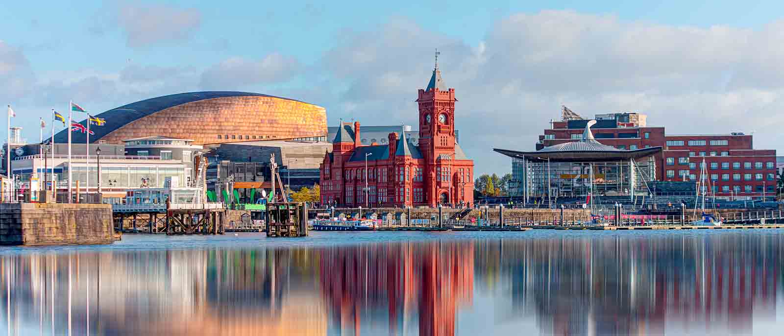Cardiff, Wales Panoramic view of the Cardiff Bay river sea water blue sky