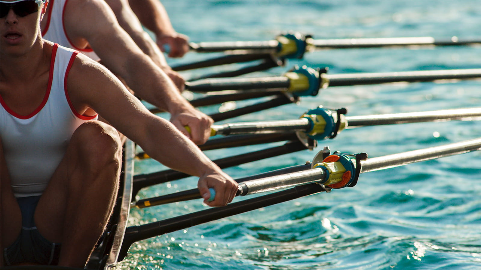 rowing team blue water river sport