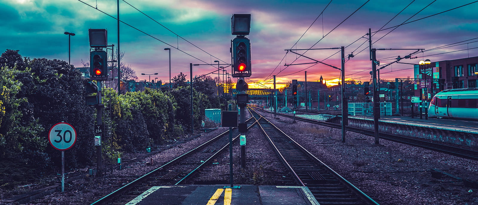 train station platform tracks, sunset sky clouds, York, UK