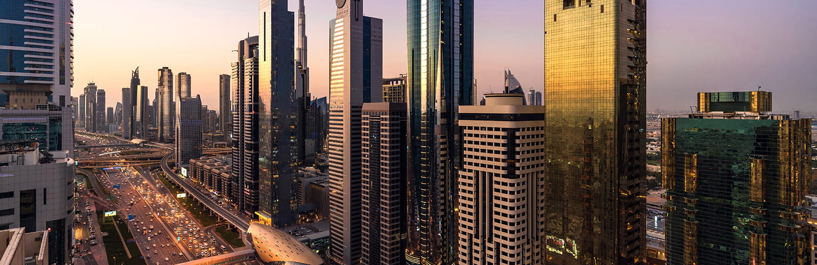 Aerial view of cityscape at sunset in Dubai UAE skyscrapers