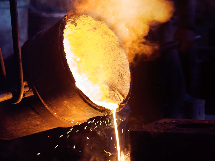 molten gold production pouring refinery industrial