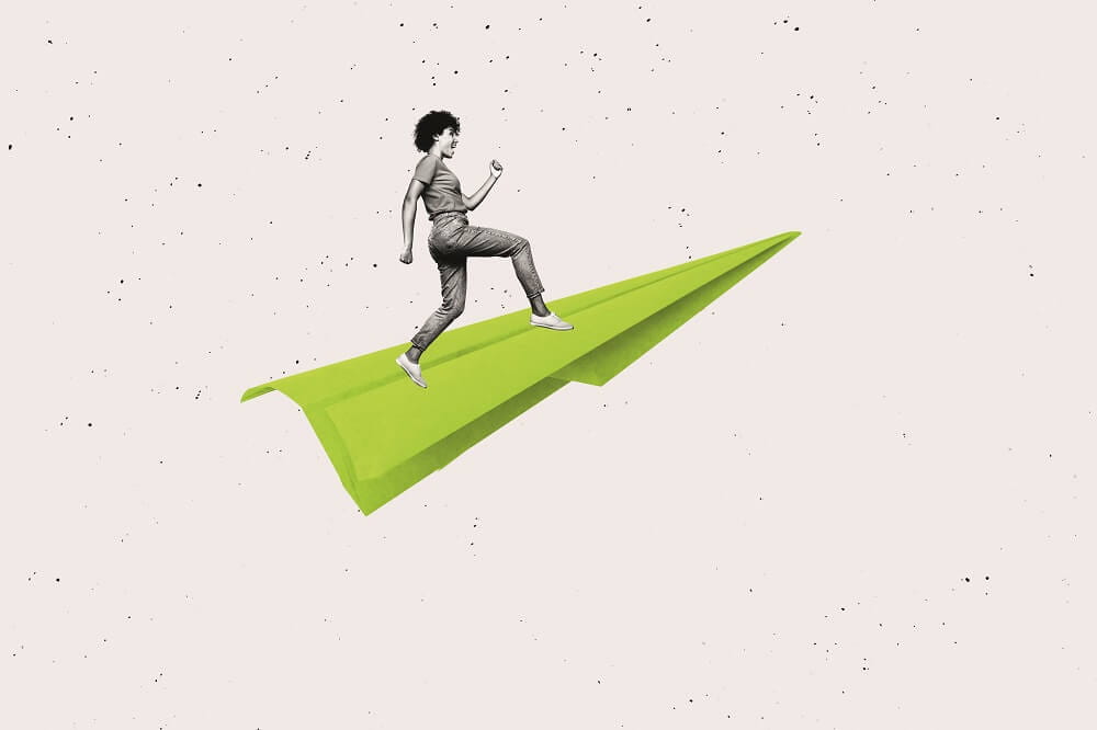 Image of woman on paper plane