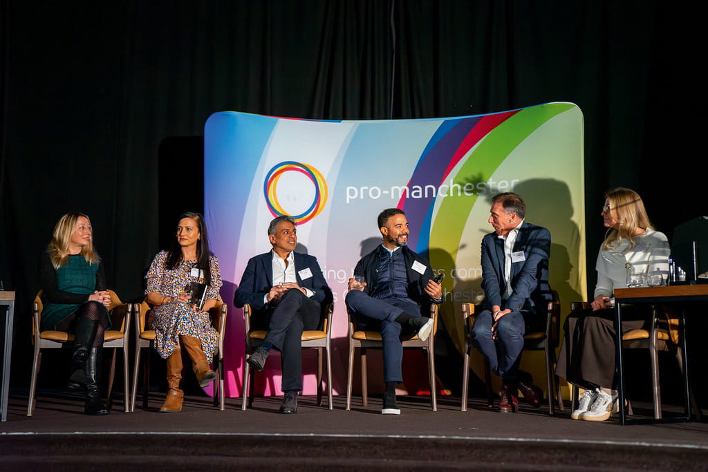Six people on a stage at a CFF event in Manchester