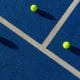Image of three tennis balls on court