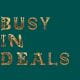 Text saying 'Busy in deals' in gold on a green background
