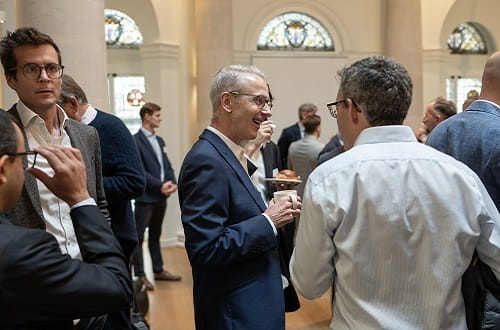 Members networking at the commercial due diligence guideline launch