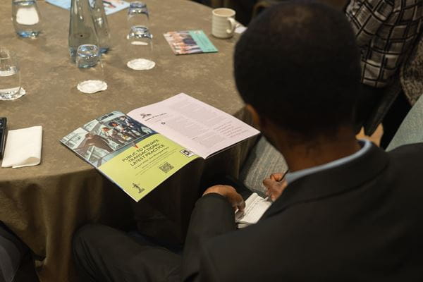 Audience member at Public to Private Transactions report launch