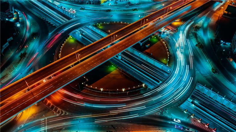 Aerial view above roads at night