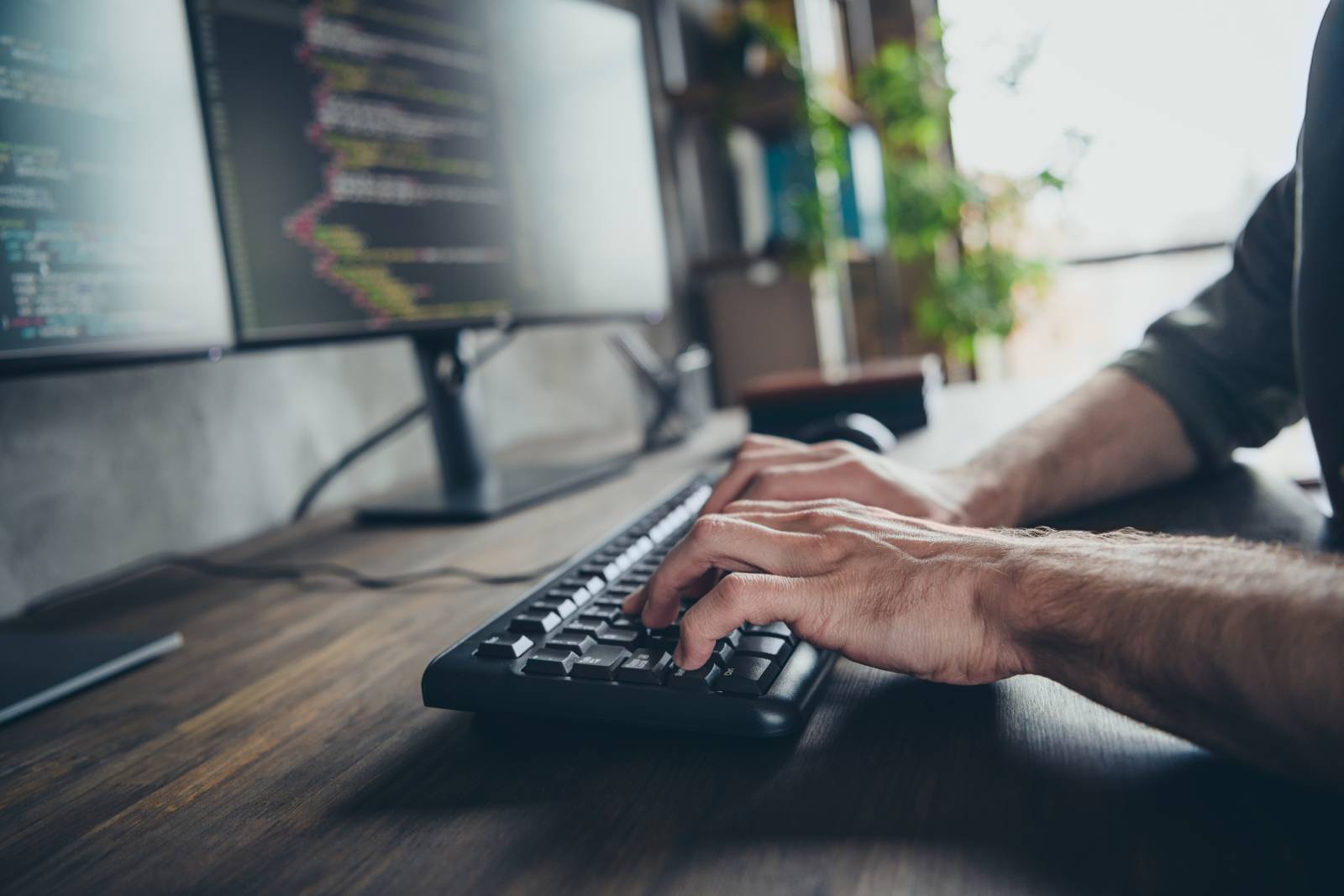 Person typing on computer