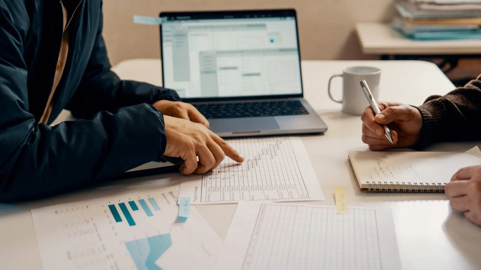 Workers analysing data