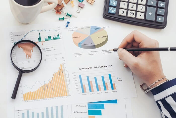 Chart with magnifying glass