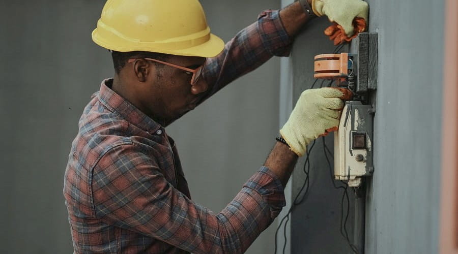 Man repairing an electricity connection