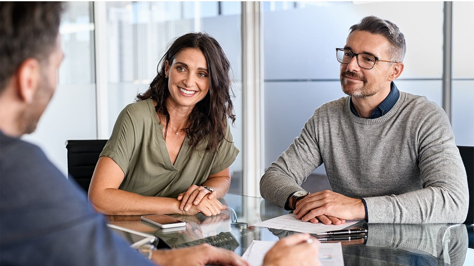 meeting room office company corporate employees colleagues managers talking discussing work smiling man woman