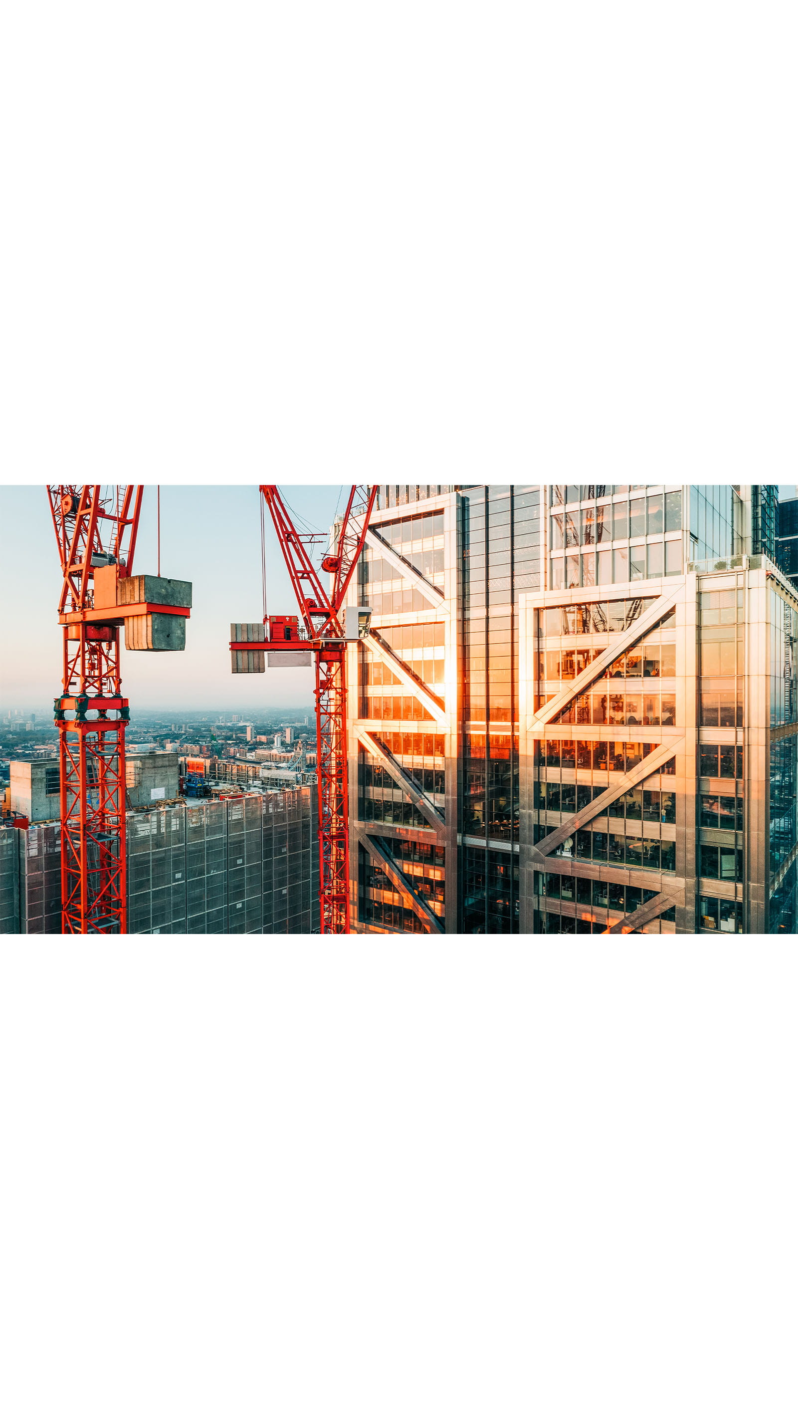 building new construction skyscraper crane city ICAEW economy