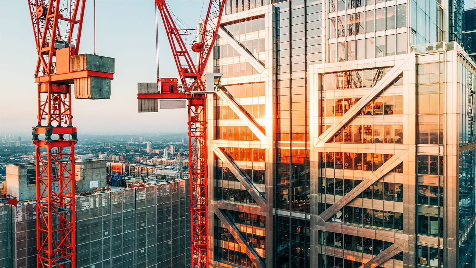 building new construction skyscraper crane city ICAEW economy