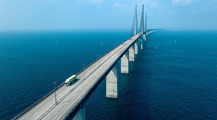 long bridge road concrete truck ocean sea water international trade economy business ICAEW