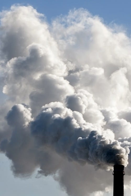 A chimney billowing smoke