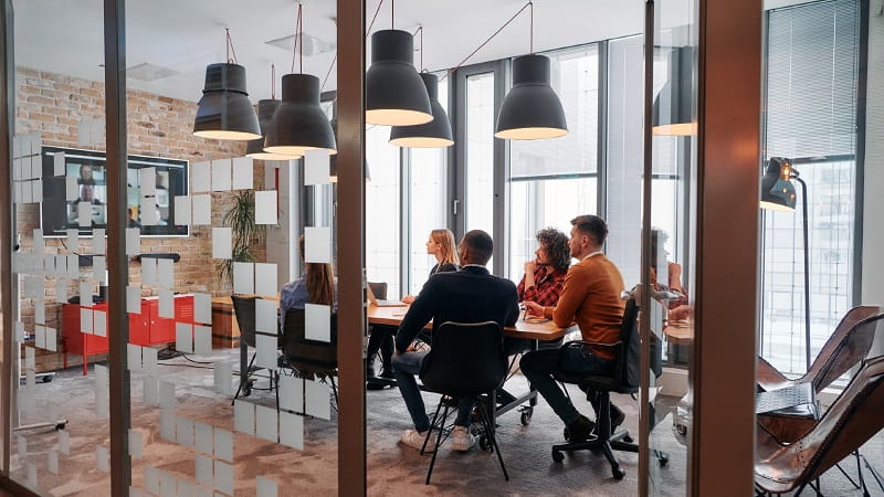 Image of colleagues in meeting room